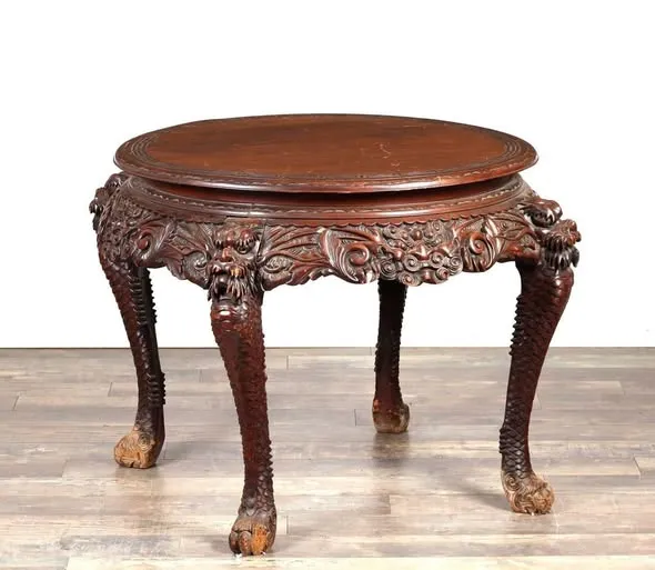 Bàn tròn gỗ chạm rồng, chân móng thú